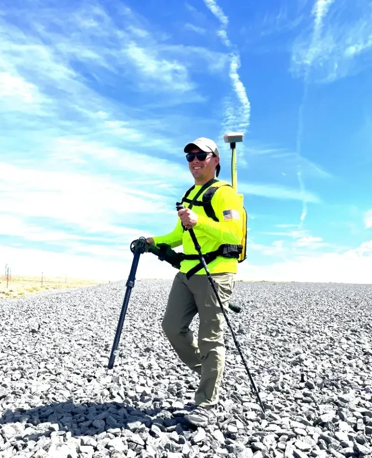 Drummond Carpenter Field Technician with GPS Survey Equipment